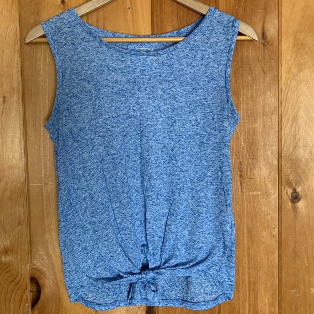 Blue tank top with tie at the bottom